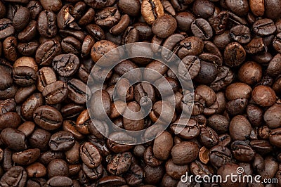 Energy stimulant and smooth java concept with full frame photograph of piled roasting coffee beans backgrounds Stock Photo