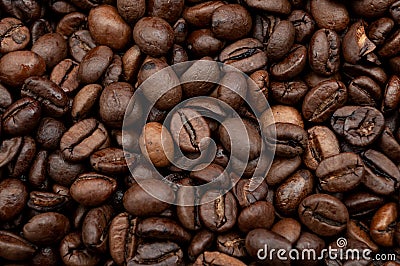 Energy stimulant and smooth java concept with full frame photograph of piled roasting coffee beans backgrounds Stock Photo