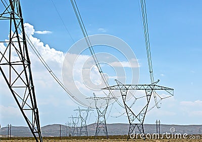 Energy Transmission Lines Across Desert Stock Photo