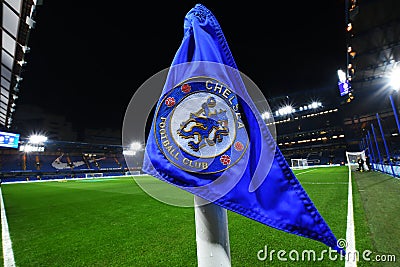 Corner Flag with Chelsea crest and Stamford Bridge in the background Editorial Stock Photo