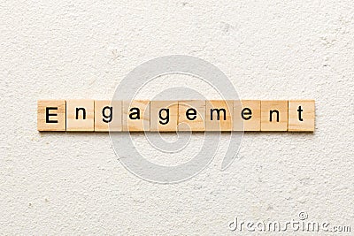 engagement word written on wood block. engagement text on table, concept Stock Photo