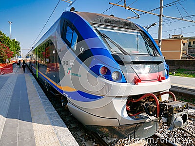 An Italian regional train type ETR 427 waiting at the platform at Pompeii Station in Italy Editorial Stock Photo