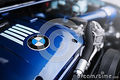 Engine motor of BMW car close-up with emblem Editorial Stock Photo