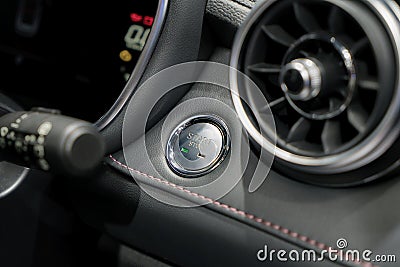 Engine start button and engine stop in car Stock Photo