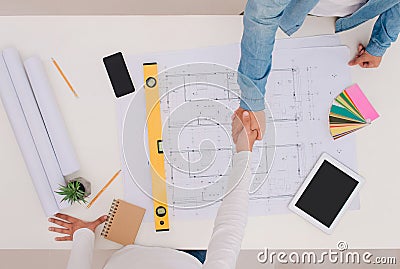 Engineer or architect and businessman shaking hands for teamwork Stock Photo