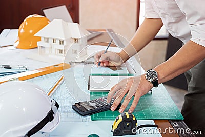 Engineer or Architect calculate and sketch the drawing construction building. Civil engineering, Architect concept Stock Photo