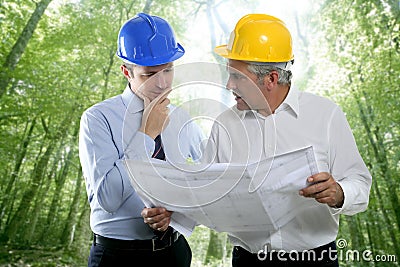 Engineer architect two expertise team plan forest Stock Photo