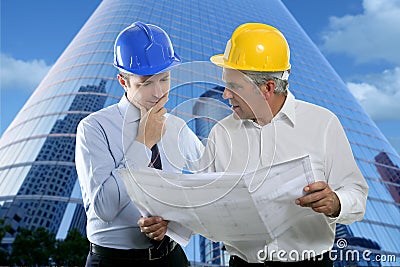 Engineer architect two expertise team plan hardhat Stock Photo