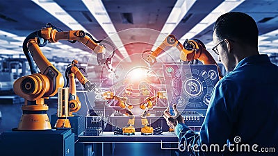 Engineer check and control welding robotics automatic arms machine in intelligent factory Digital manufacturing operation. Stock Photo
