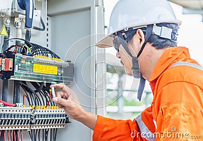 Engineer checking for abnormal solar power system operation And found that there is a lack of DC Fuse, resulting in a reduced Stock Photo