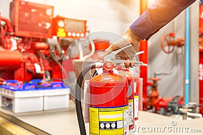 Engineer checking Industrial fire control system,Fire Alarm controller, Fire notifier, Anti fire.System ready In the event of a Stock Photo