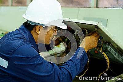 Engineer checking and repairing the electrical system Stock Photo