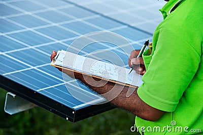 Engineer checking solar station Stock Photo