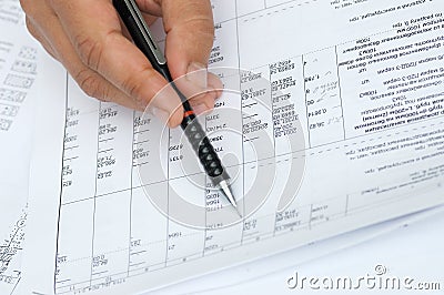 The engineer checks calculations. Stock Photo