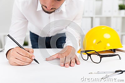 Engineer correcting mistake Stock Photo