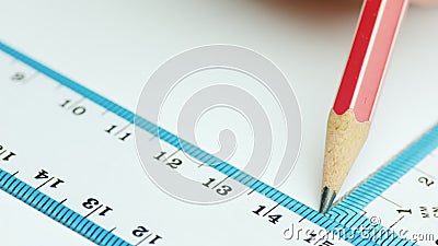 The engineer draws parallel lines in the drawing with a ruler and a triangle. Design concept Stock Photo