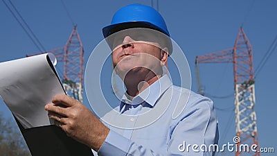 Engineer Electrician Working in Breakfast Time Eat and Read in Agenda. Stock Photo
