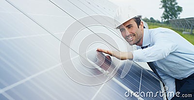 Engineer expert in solar energy photovoltaic panels with remote control performs routine actions for system monitoring using clean Stock Photo
