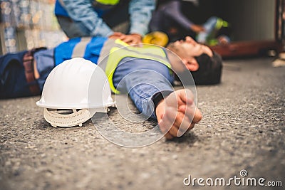 Engineer or foreman has an accident while working on Container ship. Logistics global import or export shipping industrial concept Stock Photo