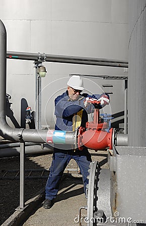 Engineer and fuel tank storage Stock Photo