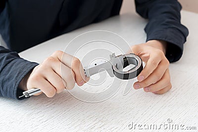 the engineer hand working and measure the parts with caliper tool Stock Photo