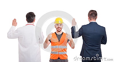 Engineer holding fingers crossed for luck Stock Photo