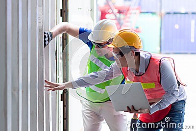 Engineer inspection and checking goods cargo container wall strength for safety according to international rule and Intermodal Stock Photo