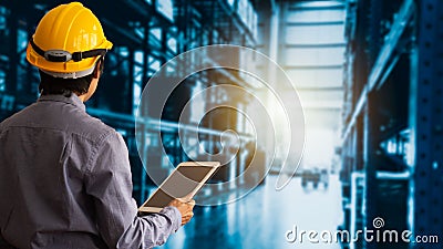 Engineer manager Wearing hard Hat using tablet check and control for workers Stock Photo