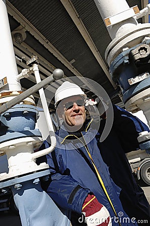 Engineer at oil and gas depot Stock Photo