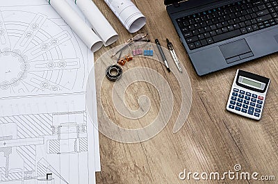 Engineer`s workplace with different details on wooden table Stock Photo