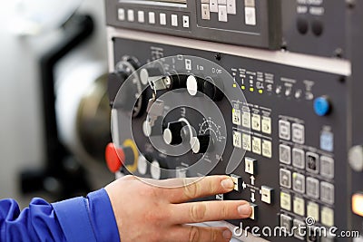 Engineer setup operation parameters of CNC lathe Stock Photo