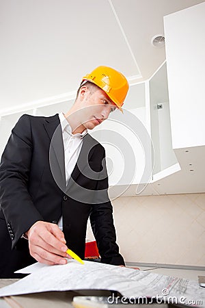 Engineer studying a plan Stock Photo