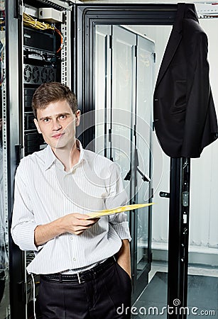 The engineer in suit stand in data center Stock Photo