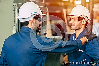 Engineer supervisor admired and proud his worker team, working good more efficiently Stock Photo