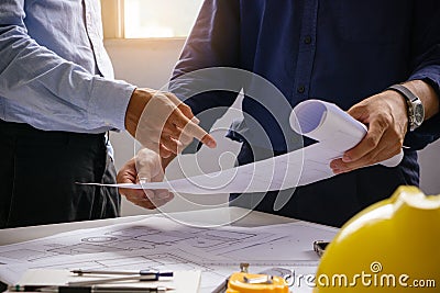 engineer team working in office with blue prints.Team of architects people Stock Photo