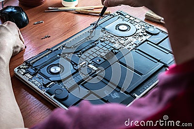 Engineer technician man upgrade and maintenance digital pc. Solutions services electronic hardware. Technology chip equipment Stock Photo