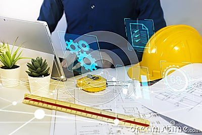 Engineer Troubleshooting and Management,House plans, construction business and real estate Stock Photo