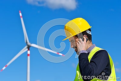 Engineer in Wind Turbine Power Generator Station Stock Photo