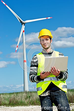 Engineer in Wind Turbine Power Generator Station Stock Photo