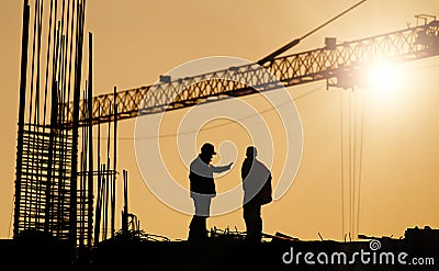 Engineer and worker at building site Editorial Stock Photo