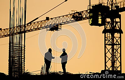 Engineer and worker at building site Editorial Stock Photo