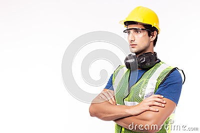 Engineer or worker in hardhat, safety vest, safety glasses in factory or site work. Engineer or professional contractor cross arm Stock Photo