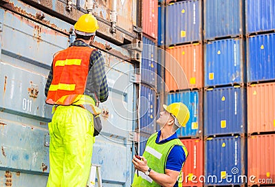 Engineer and worker team checking containers box from cargo, Happiness and Teamwork concept Stock Photo