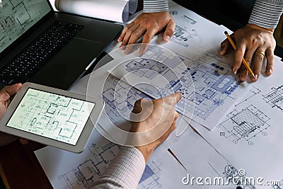 Engineering, consulting, design, construction, with colleagues, plan design, details, industrial drawing and many drawing tools Stock Photo
