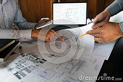 Engineering, consulting, design, construction, with colleagues, plan design, details, industrial drawing and many drawing tools Stock Photo