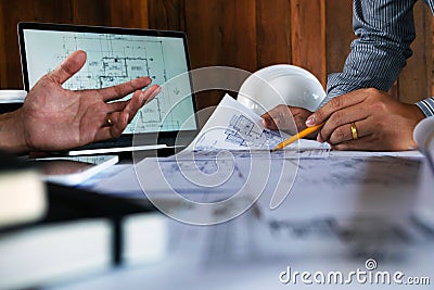 Engineering, consulting, design, construction, with colleagues, plan design, details, industrial drawing and many drawing tools Stock Photo