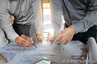 Engineering, consulting, design, construction, with colleagues, plan design, details, industrial drawing and many drawing tools Stock Photo