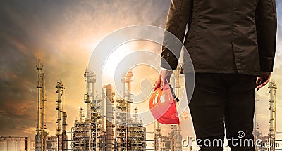 Engineering man with safety helmet standing in industry estate a Stock Photo