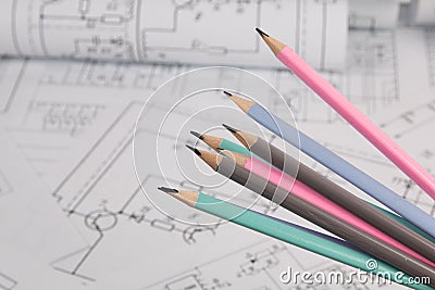 Engineering pencils on background of electrical engineering drawings Stock Photo