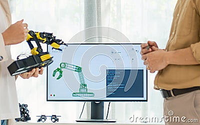 engineering robot technology with asian programmer innovation and research teamwork in coding development Stock Photo